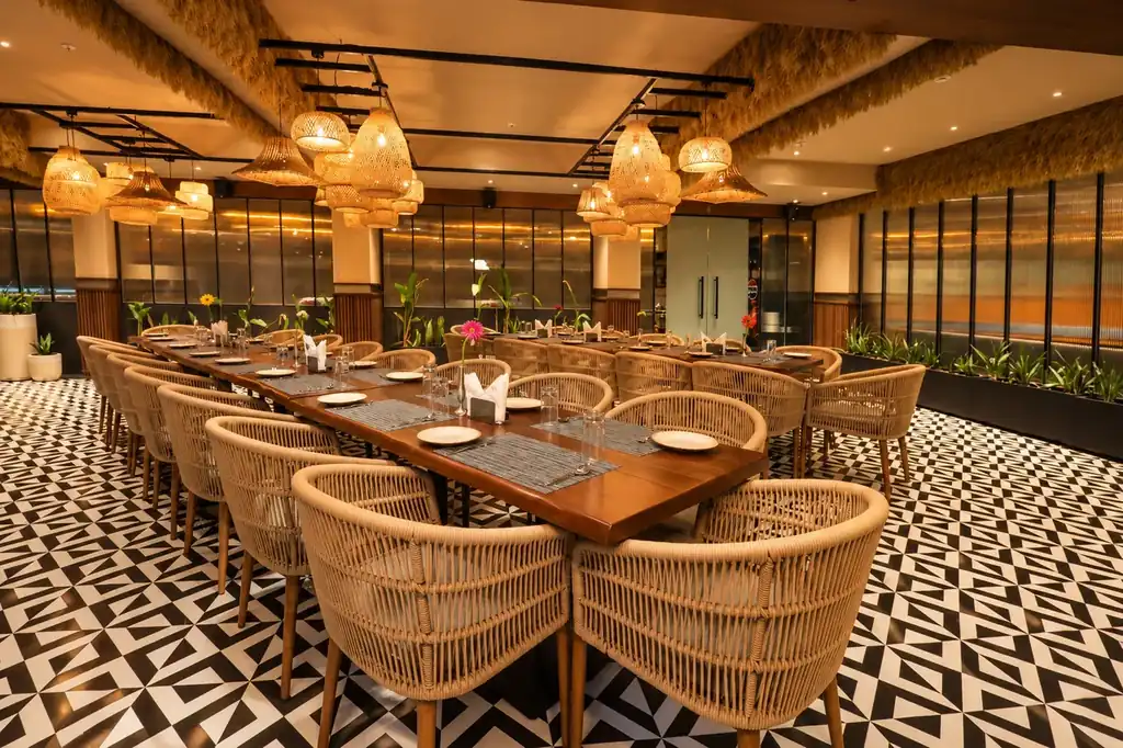 Spacious long dining table arrangement for family reunions and banquet dining at Brick and Brew
